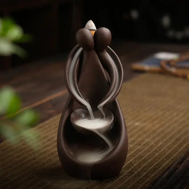 https://yeechop.com/products/ceramic-waterfall-incense-burner-buddha-hand-censer-holder?_pos=1&_sid=3bf4e49d9&_ss=r