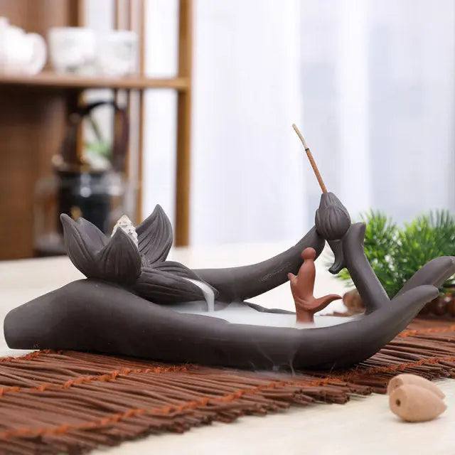 https://yeechop.com/products/ceramic-waterfall-incense-burner-buddha-hand-censer-holder?_pos=1&_sid=3bf4e49d9&_ss=r