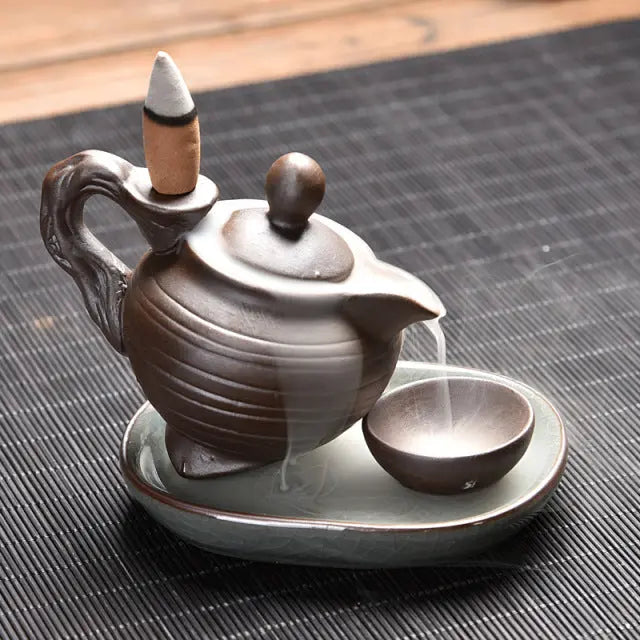 https://yeechop.com/products/ceramic-waterfall-incense-burner-buddha-hand-censer-holder?_pos=1&_sid=3bf4e49d9&_ss=r