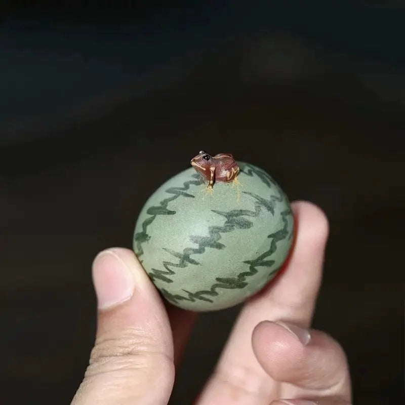 https://yeechop.com/products/ceramic-watermelon-spraying-water-frog-tea-pet?_pos=1&_sid=140f121f9&_ss=r