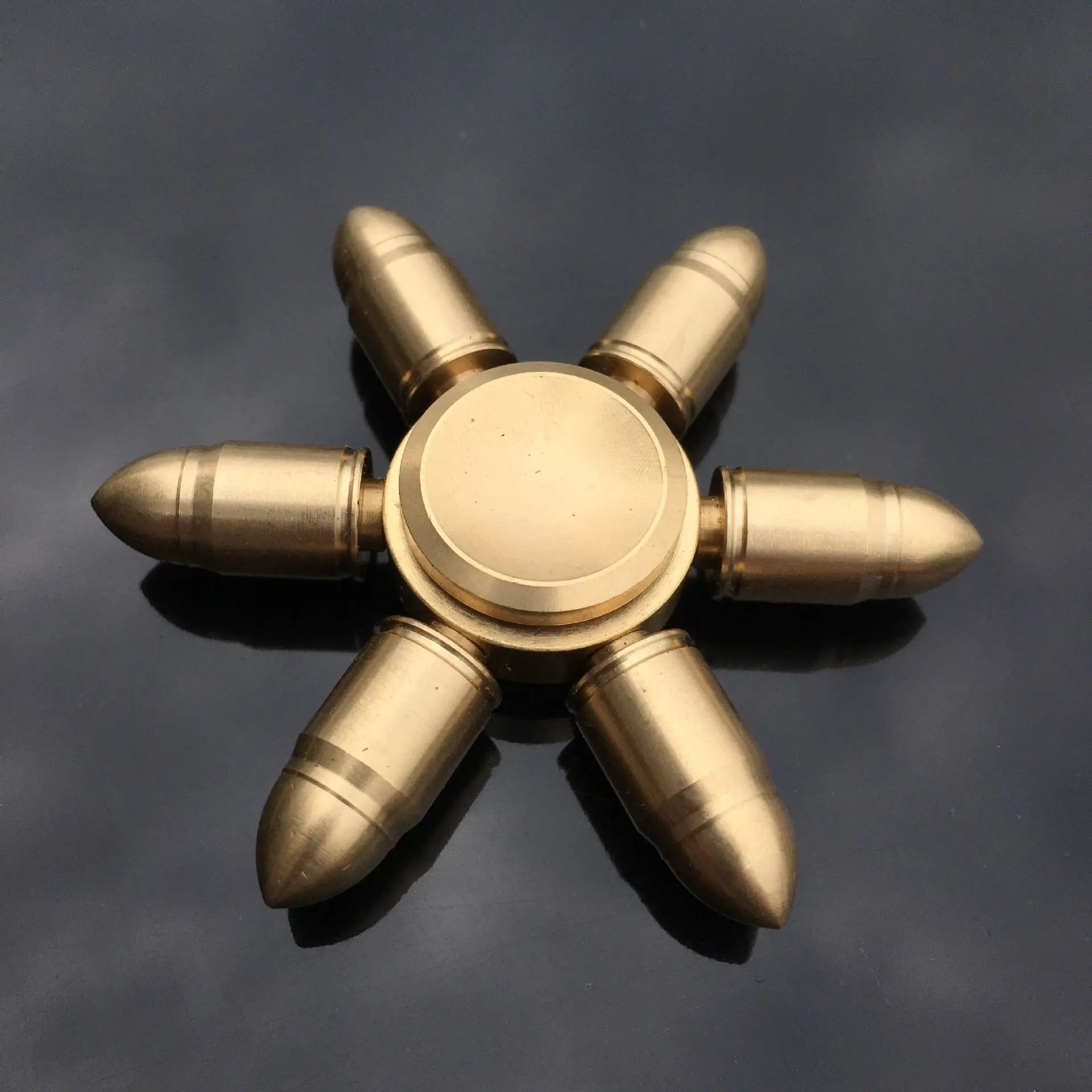 https://yeechop.com/products/copper-core-bullet-shape-finger-spinner-sr15?_pos=1&_sid=9aeee7a21&_ss=r