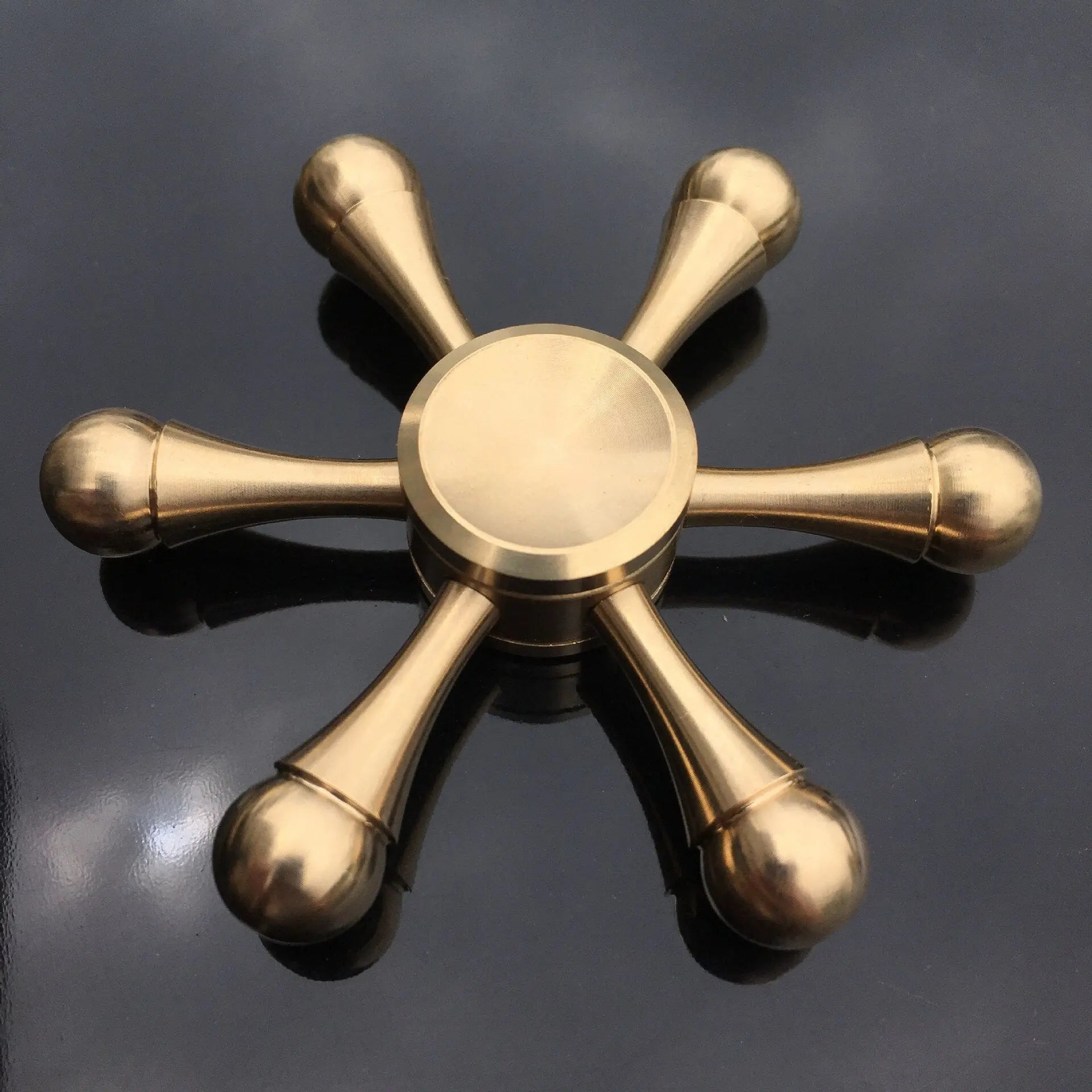 https://yeechop.com/products/copper-core-bullet-shape-finger-spinner-sr15?_pos=1&_sid=9aeee7a21&_ss=r