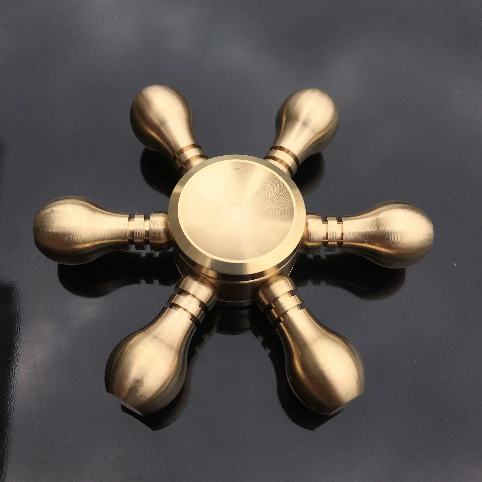 https://yeechop.com/products/copper-core-bullet-shape-finger-spinner-sr15?_pos=1&_sid=9aeee7a21&_ss=r